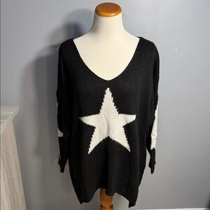 Elegant Black V-Neck Sweater with White Star Design